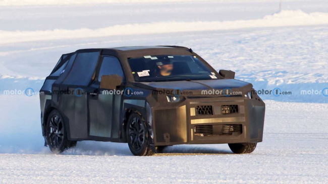 mystery peugeot crossover spied wearing lots of body covering