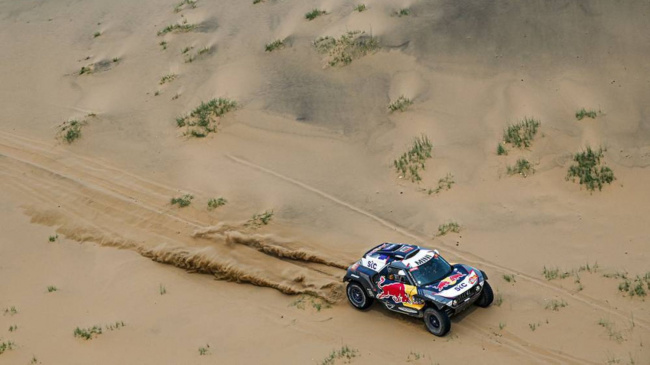 dakar review after stage 11: another stage win for al-attiyah but peterhansel still leads overall.