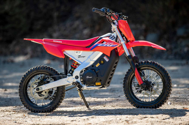 Familiar CRF stance, down to the twin-spar-aluminum frame. Greenger Powersports manufactures the CRF-E2 as an officially licensed Honda product, and the bike is sold only in Honda dealerships.