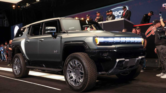 first 2024 gmc hummer ev suv sells for $500,000 at auction