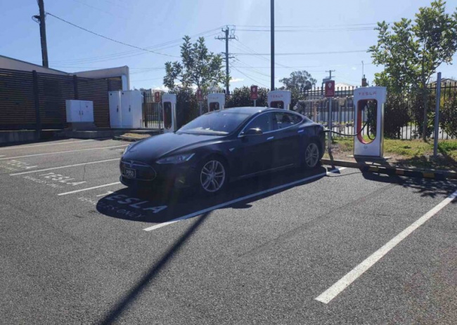 tesla community is divided over open superchargers: here’s why it is a good move