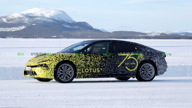 lotus electric sedan shows its sleek production body for first time