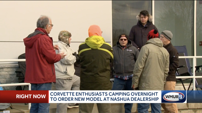 a bunch of corvette fans camped out overnight to be the first to reserve a new corvette e-ray