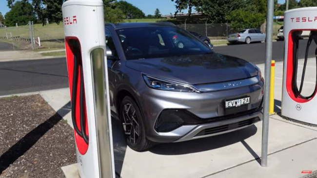 byd atto 3 charges up at a tesla supercharger in australia