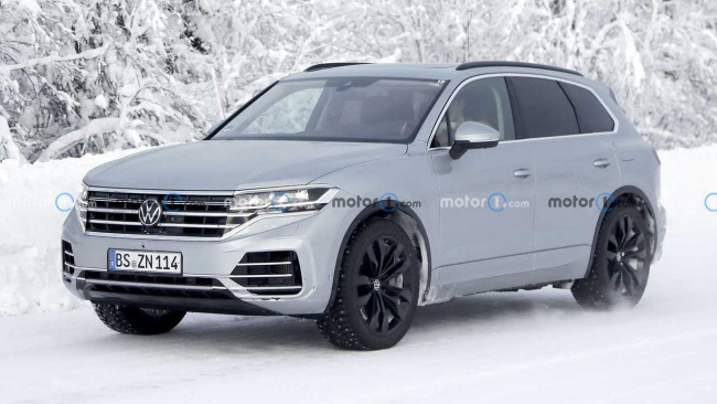 volkswagen touareg uses stickers to hide new styling in spy photos
