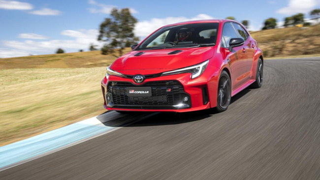 Toyota hopes customers will exploit the car’s performance on track., Toyota GR Corolla customers can choose between the GTS (shown in red) and Morizo., Keen drivers will appreciate a manual gear lever, handbrake and three pedals., Oh, what a feeling., The GR Corolla GTS is a different kind of Toyota., Technology, Motoring, Motoring News, Why Toyota won’t sell the GR Corolla to thousands of customers