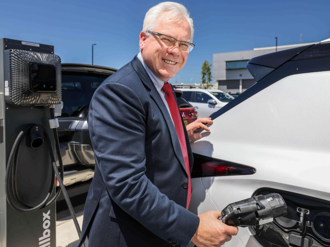 Mitsubishi Motors Australia chief executive officer Shaun Westcott powers up an electric car. Picture: Russell Millard, National, South Australia, Home batteries on wheels: Mitsubishi boss says SA is poised to drive an energy evolution
