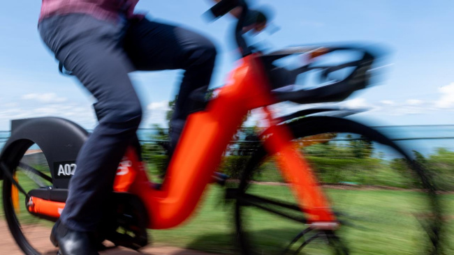 Aussie commuters are gravitating toward E-bikes. will be available via the same system and app as their already popular e-scooters. Picture: Che Chorley, Electric scooters are growing in popularity. Picture: Richard Walker, Technology, Motoring, Motoring News, Aussies to be paid to ditch their cars in new trial