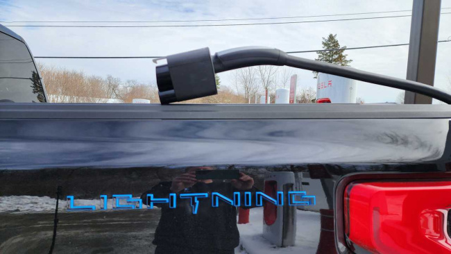 we charge a ford f-150 lightning with tesla's magic dock