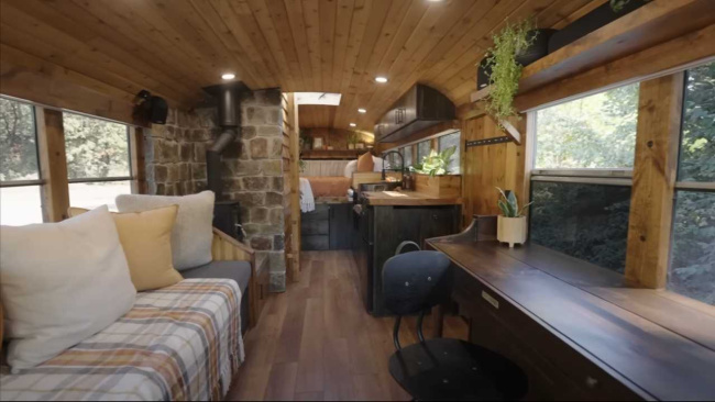 The inside of a converted school bus into a motorhome.