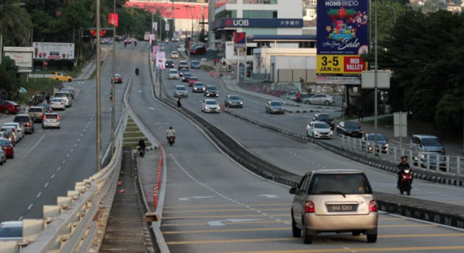 autos news, reopening of damansara link delayed until december