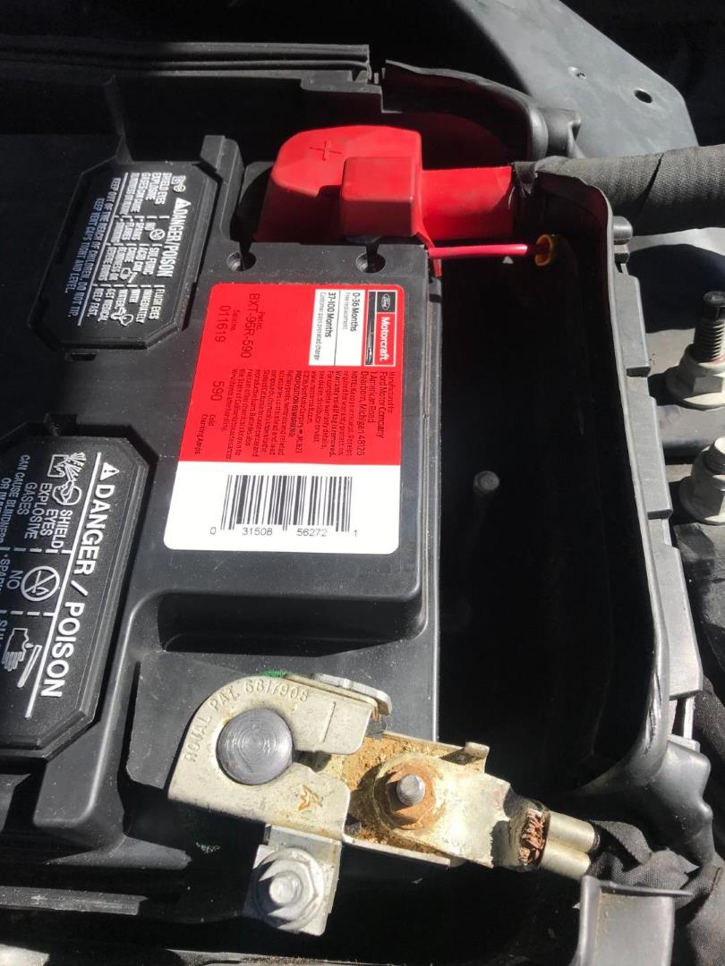 how to replace the car battery on a ford mustang