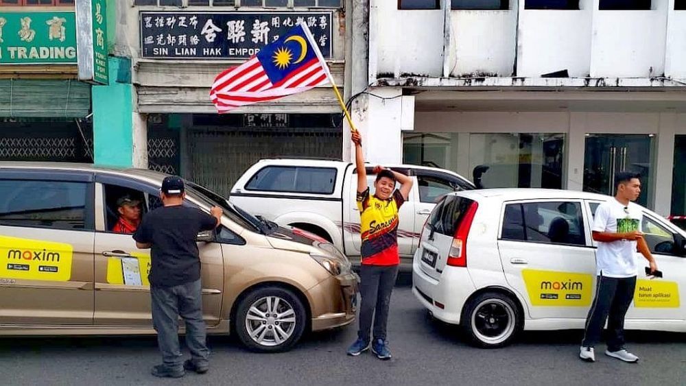 auto news, maxim, e-hailing, malaysia, jpj, evp, license, permit, kuantan, grab, taxi, maxim calls jpj's charges of their drivers not having evp permits 'inaccurate'