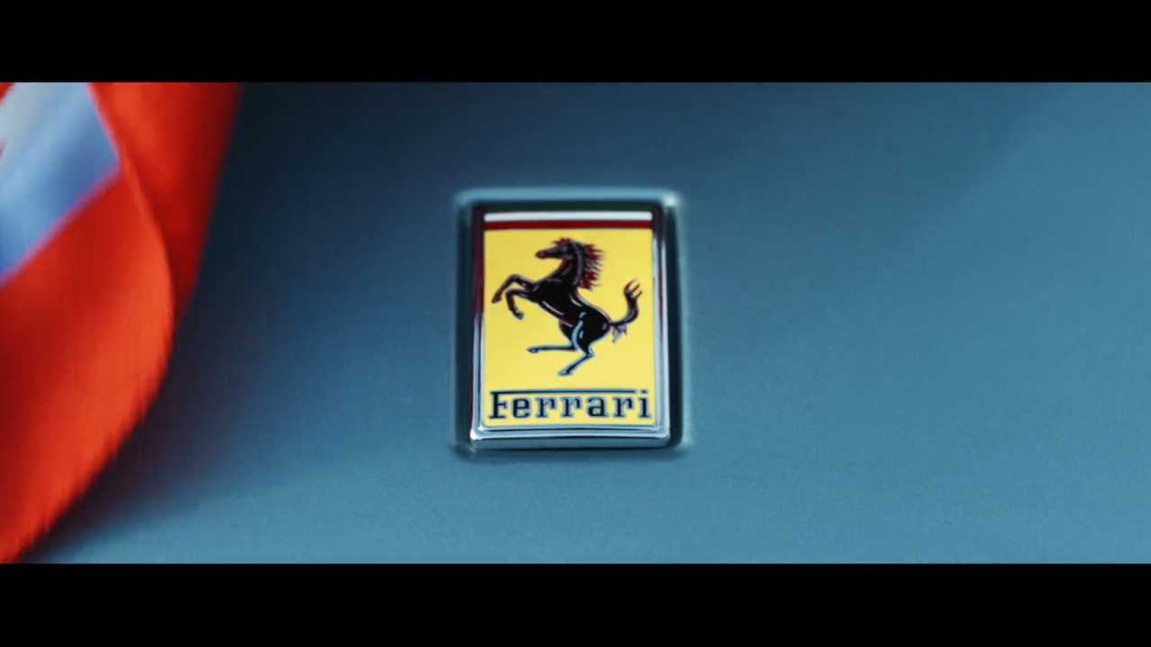 ferrari teaser video shows badge on silver car, could be roma spider