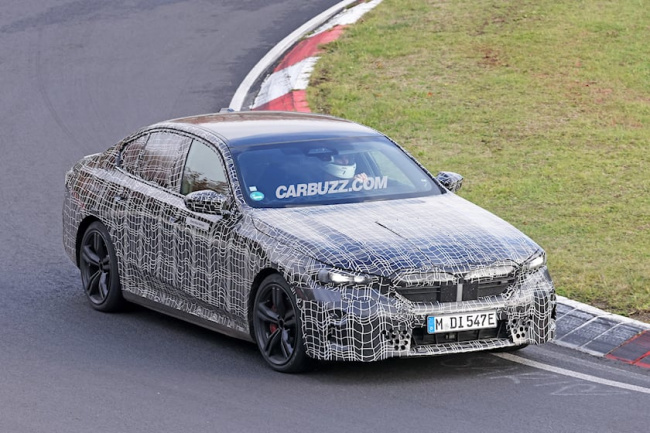 technology, teaser, the new 5 series will debut this october with hybrid and all-electric variants