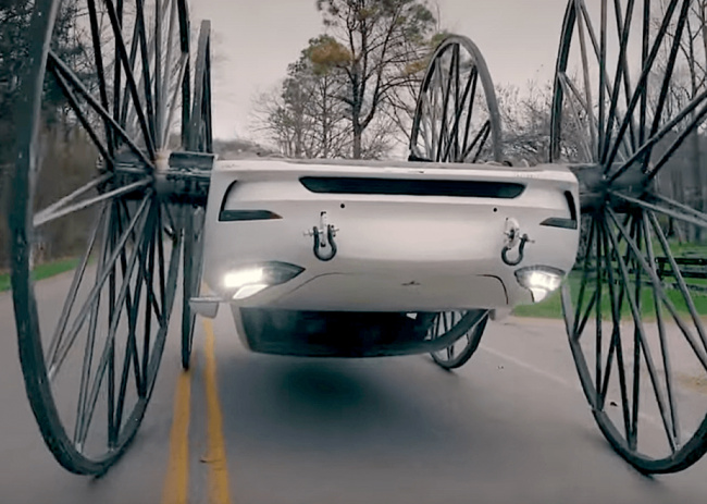 weird car news, watch: your upside-down tesla model 3 on 115-inch wheels for today