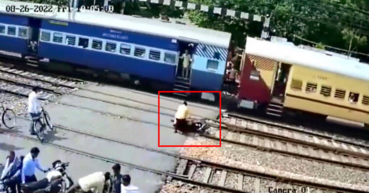 speeding indian railways train in uttar pradesh's etawah hits stuck bike on crossing and blows it to pieces