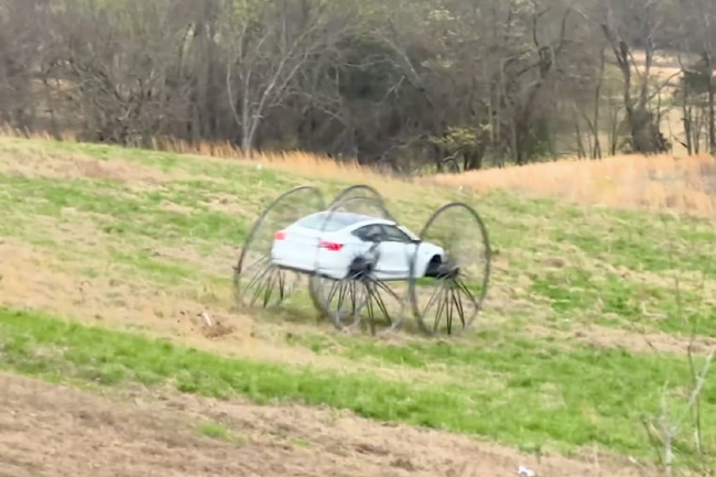 video, offbeat, upside down tesla model 3 is the craziest thing you'll see today