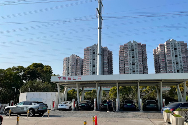 offbeat, luxury, cadillac caught offering free lyriq test drives at chinese tesla supercharger station