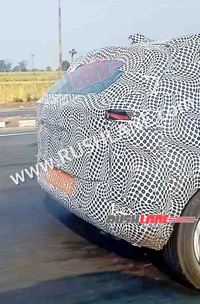 tata nexon facelift spied with harrier, safari inspired taillight