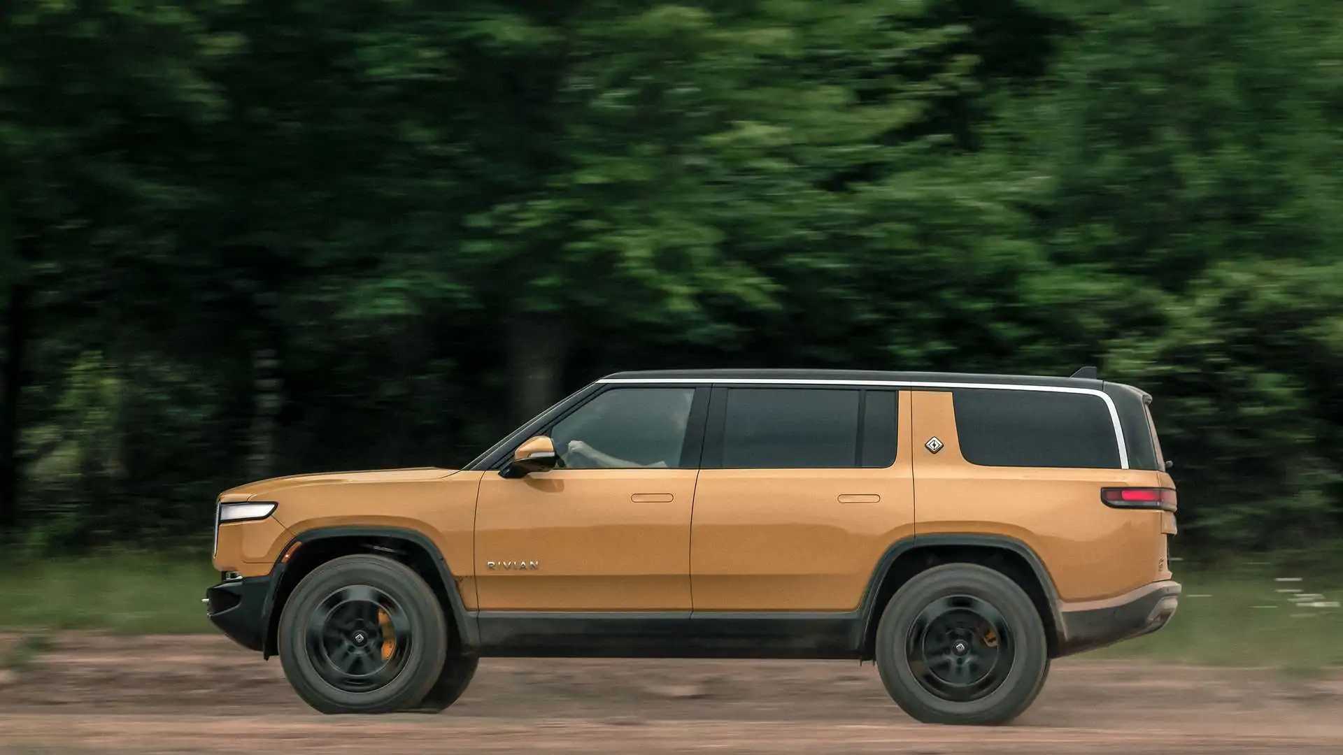 latest rivian software update adds tesla superchargers with a magic dock on the map