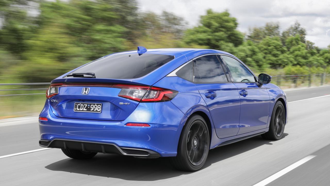 The new Civic Hybrid is a great car, but it costs $55,000., The new Honda Civic Type R promises to be a cracker – and the brand has taken 1000 orders for it., Technology, Motoring, Motoring News, Why Honda insists it won’t leave Australia