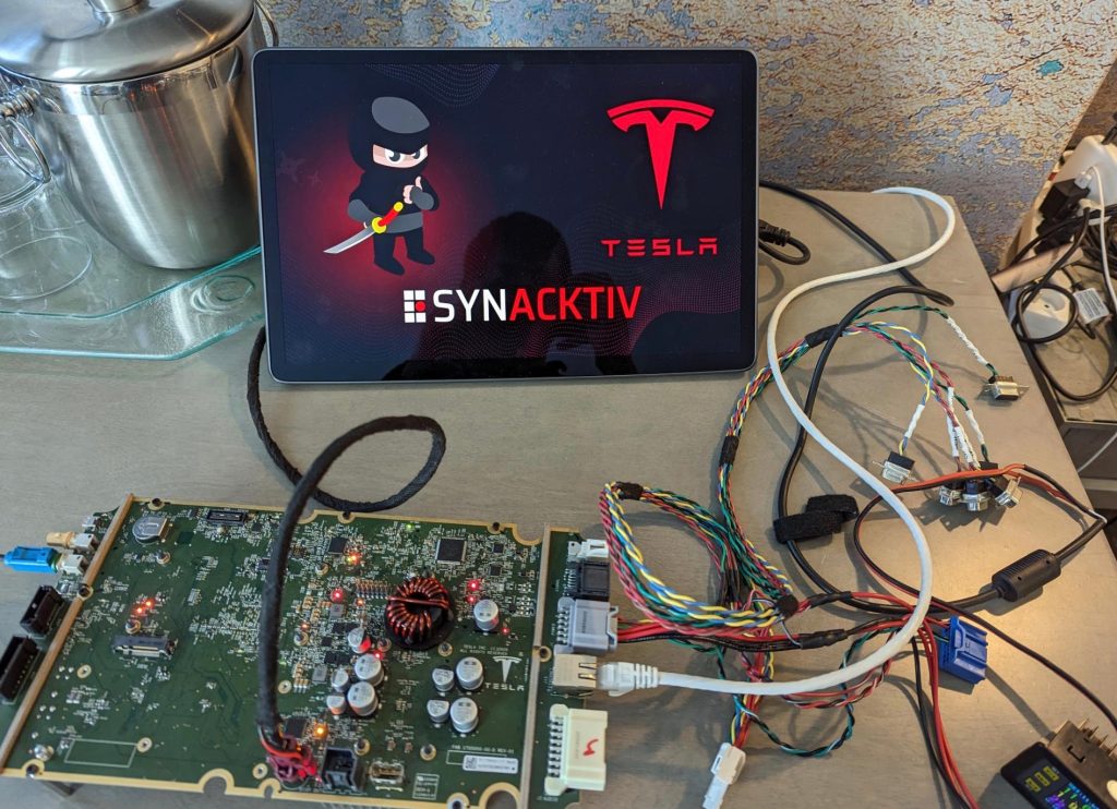tesla gets hacked – winning the hackers $100,000 and a model 3