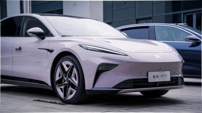 ev, report, rising auto f7 from saic launched in china with swappable batteries. starts at 30,500 usd