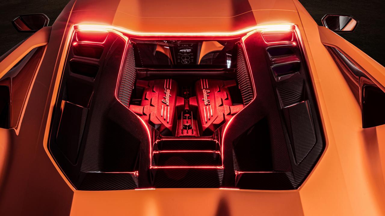 This rear-mounted V12 delivers max power above a screaming 9000rpm., It still has a whopping big V12 petrol engine, though., The Revuelto is the brand’s first plug-in hybrid., Technology, Motoring, Motoring News, 2023 Lamborghini Revuelto hybrid supercar revealed