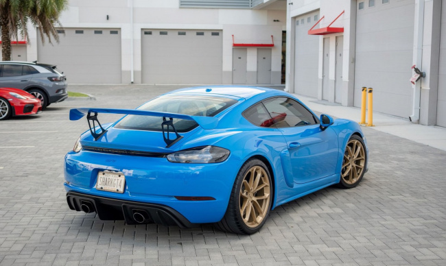 handpicked, sports, american, news, muscle, newsletter, classic, client, modern classic, europe, features, luxury, trucks, celebrity, off-road, exotic, asian, german, motorious readers get more chances to win a shark blue porsche cayman gt4