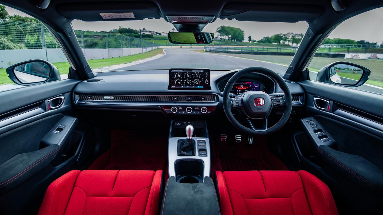 Honda’s interior is a leap beyond the competition., The Honda’s driving experience matches its powerful stance., Technology, Motoring, Motoring News, New Honda Civic Type R review