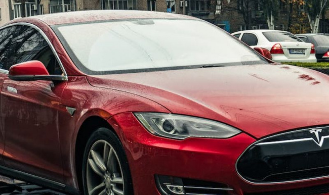autos tesla, tesla hit with class action lawsuit over alleged privacy intrusion