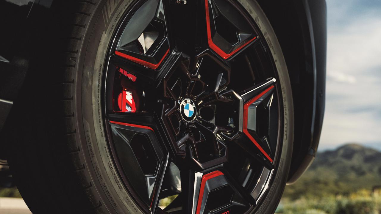 The Label Red has blood-coloured highlights inside and out., Plug-in hybrid power helps make the XM greener than some rivals., Stacked exhaust pipes play a powerful tune., The XM Label Red is BMW’s most powerful model., Technology, Motoring, Motoring News, BMW’s most powerful car is coming to Australia