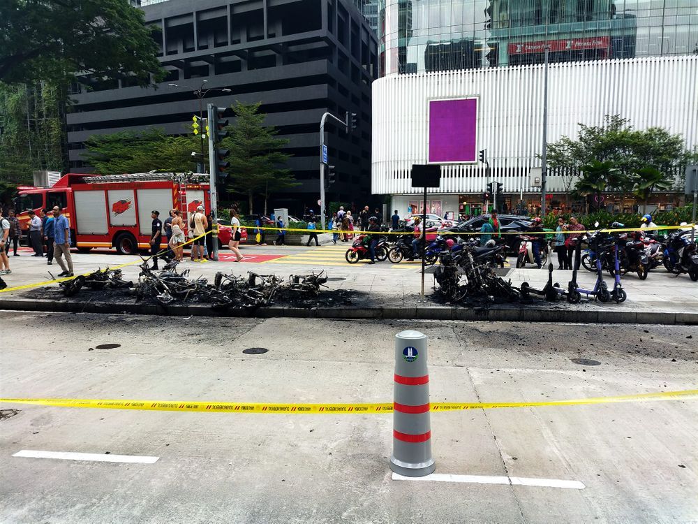 auto news, 2023, fire, bomba, electric scooter, motorcycle, kl, klcc, suria klcc, malaysia, flames destroy 9 motorcycles, 4 electric scooters in front of suria klcc