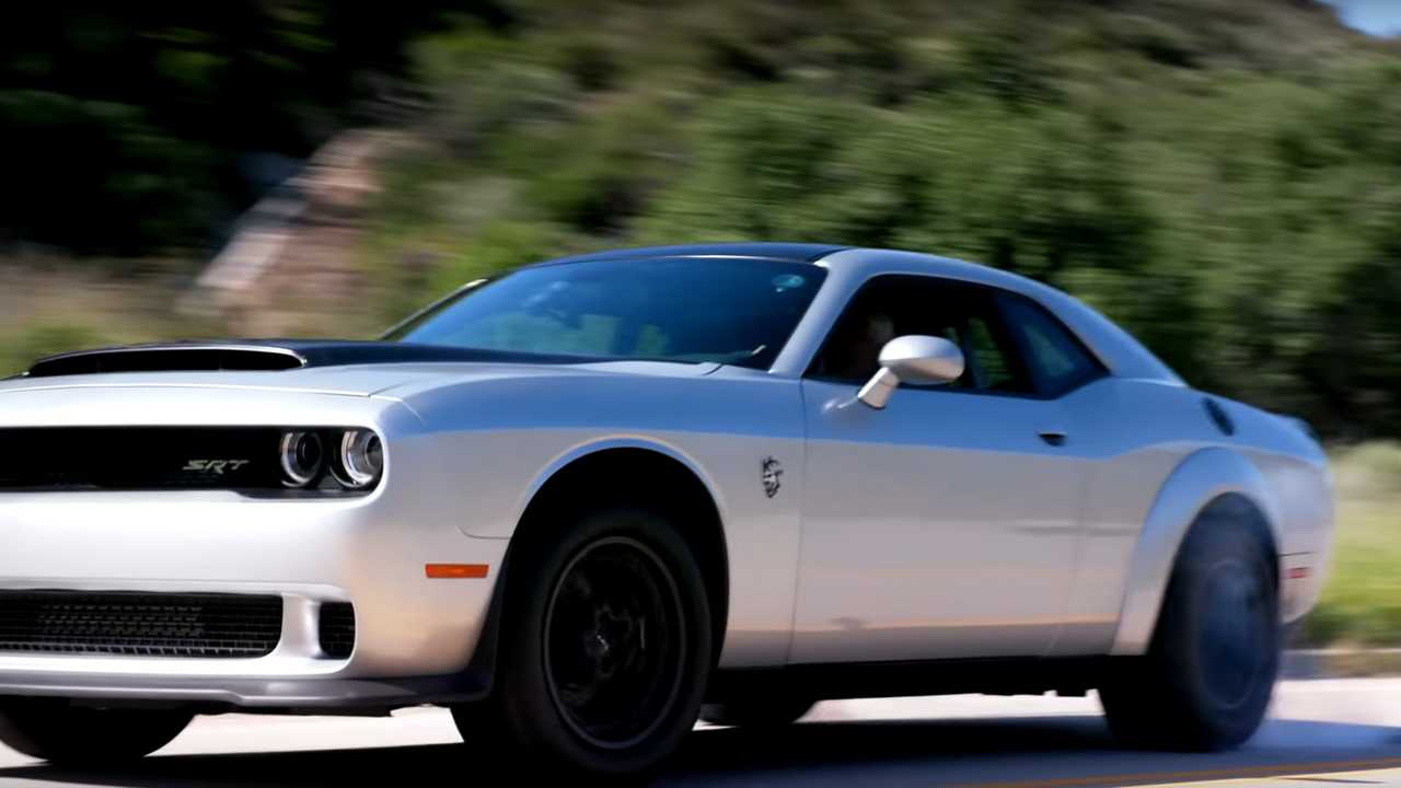 A close up showing the Dodge Challenger Demon 170 with its rear tires spinning.