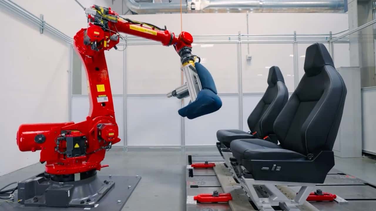 tesla shows the cybertruck's front seats in torture test video