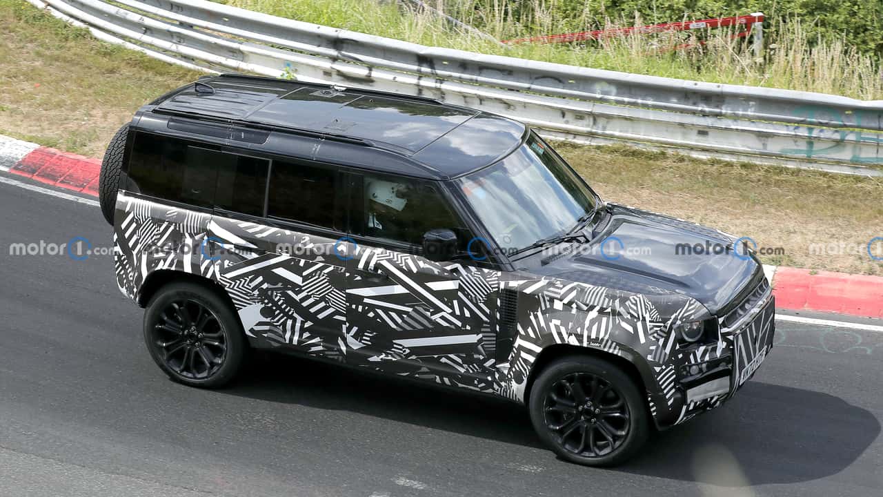land rover defender svx spied as rugged mercedes-amg g63 rival