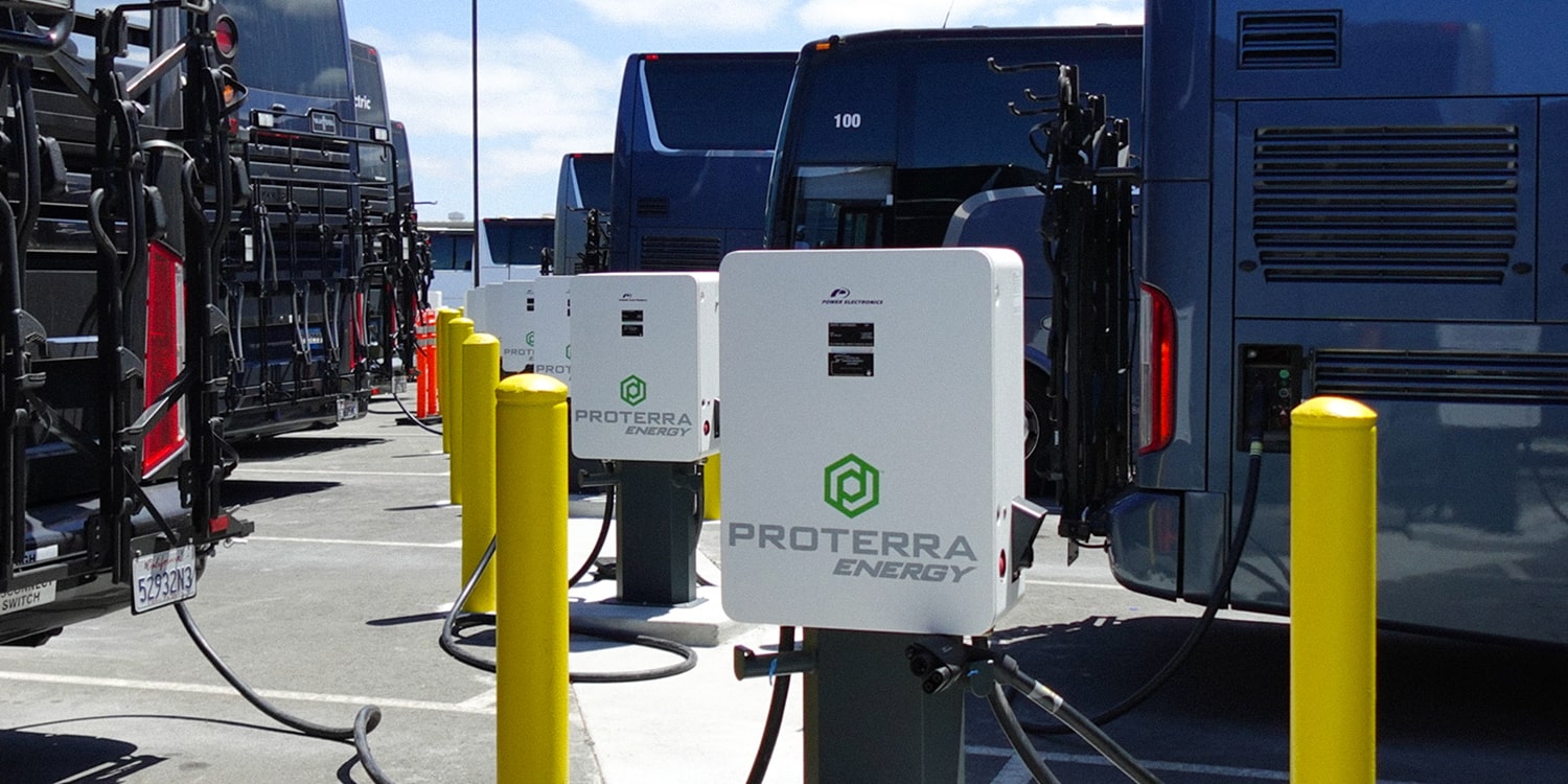 abc companies, california, charging stations, electric buses, newark, north america, proterra, tdx25e, van hool, usa: abc companies and proterra open largest motorcoach charging facility