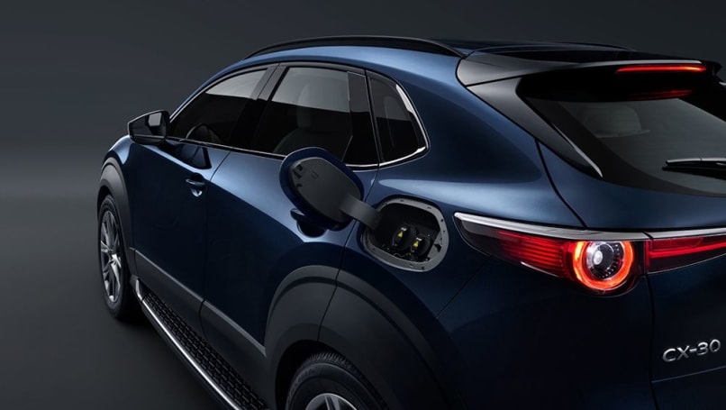 mazda cx-30, mazda mx-30, mazda cx-30 2023, mazda mx-30 2023, mazda news, electric cars, industry news, showroom news, electric, green cars, mazda evs are coming! new platform and 'three-phase' roll-out plans for mazda's electric car push, but when will you be able to buy a mazda-badged tesla rival?