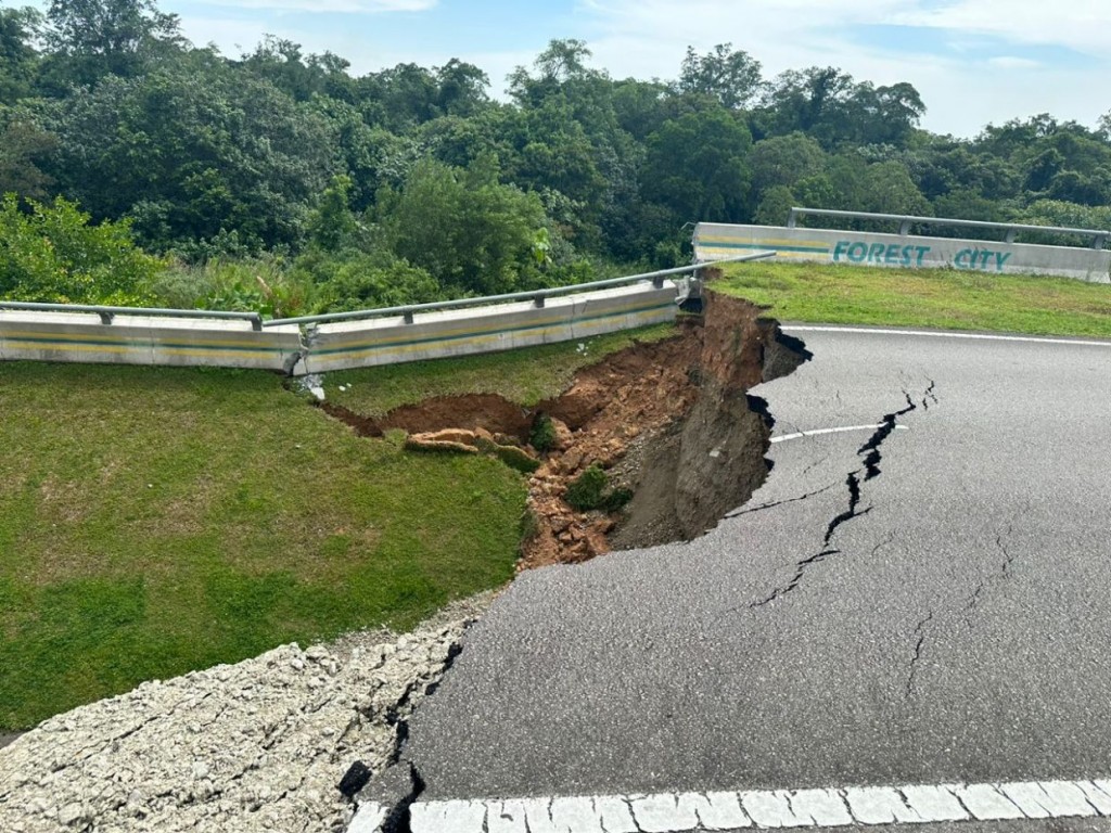 autos news, twenty-five metre stretch of road collapses in iskandar puteri