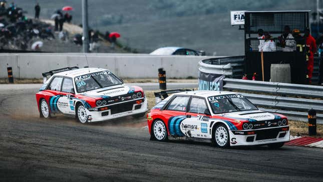 A photo of Special One racing team's two Delta Evo-e cars driving on the circuit.