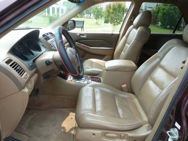 at $4,250, does this 2001 acura mdx touring offer three-rows worth of value?