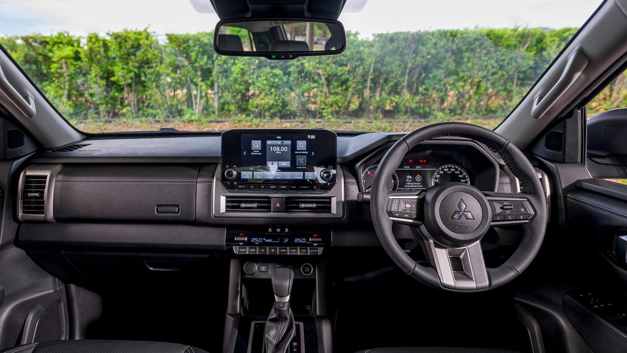 The interior has received a monster update with plenty of hi-tech items., It uses a 2.4-litre twin-turbocharged diesel engine., The new Mitsubishi Triton will arrive early next year., Technology, Motoring, Motoring News, 2024 Mitsubishi Triton new car review