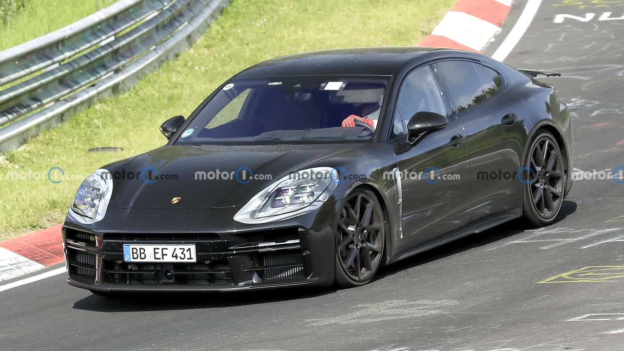 2024 porsche panamera spied on nurburgring with camouflaged headlights