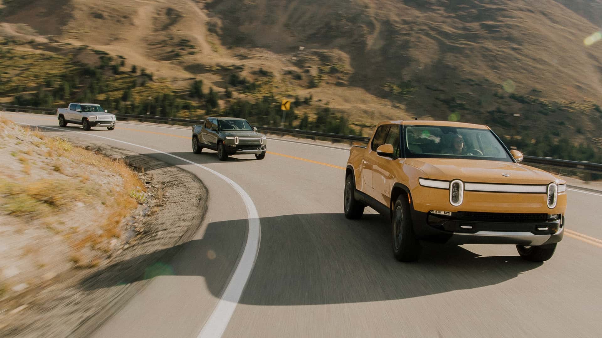 buying an ice vehicle is “like building a horse barn in 1910”: rivian ceo