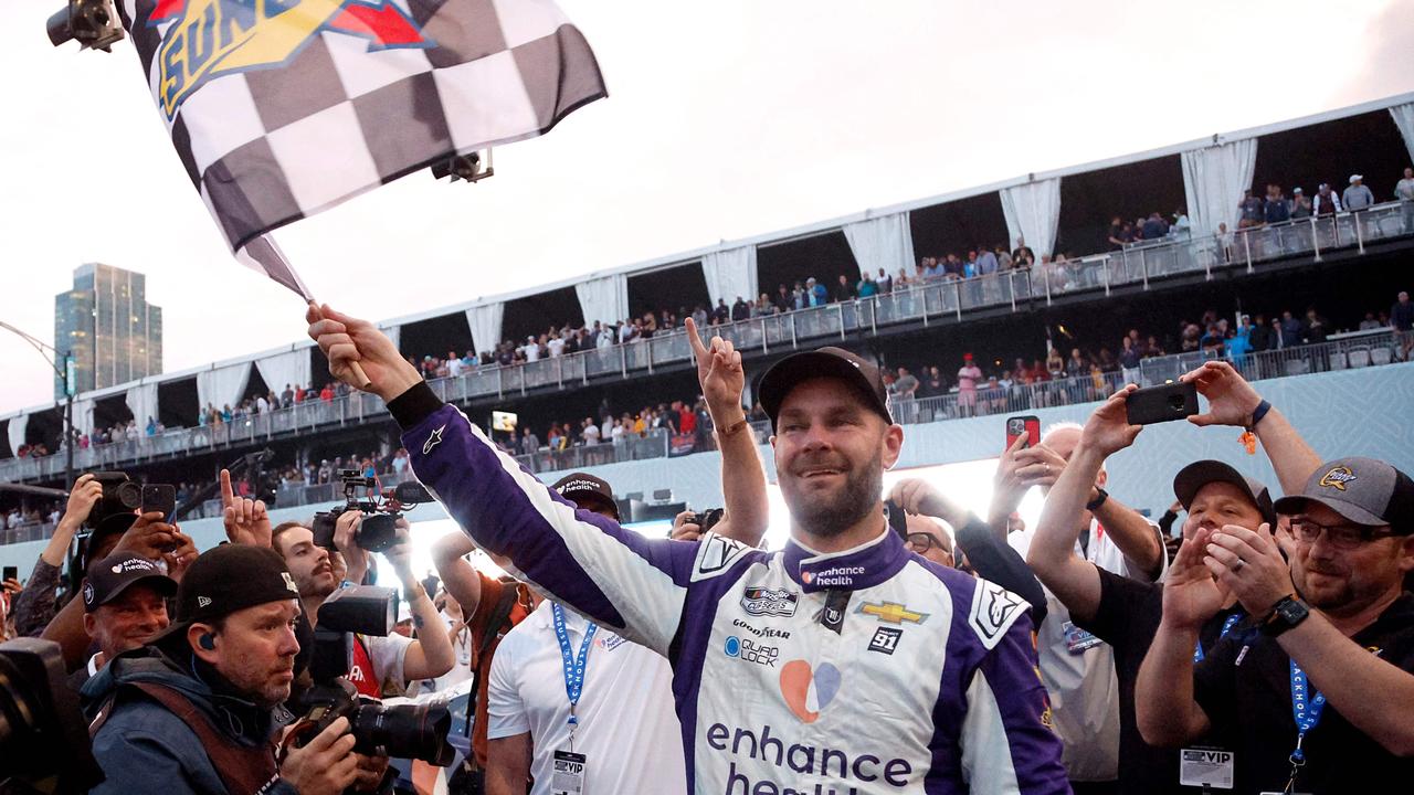 Shane van Gisbergen celebrates with the checkered flag after winning at the Chicago Street Course. Photo: Sean Gardner/Getty Images, Technology, Motoring, Motoring News, Why Aussies are wrong about Nascar