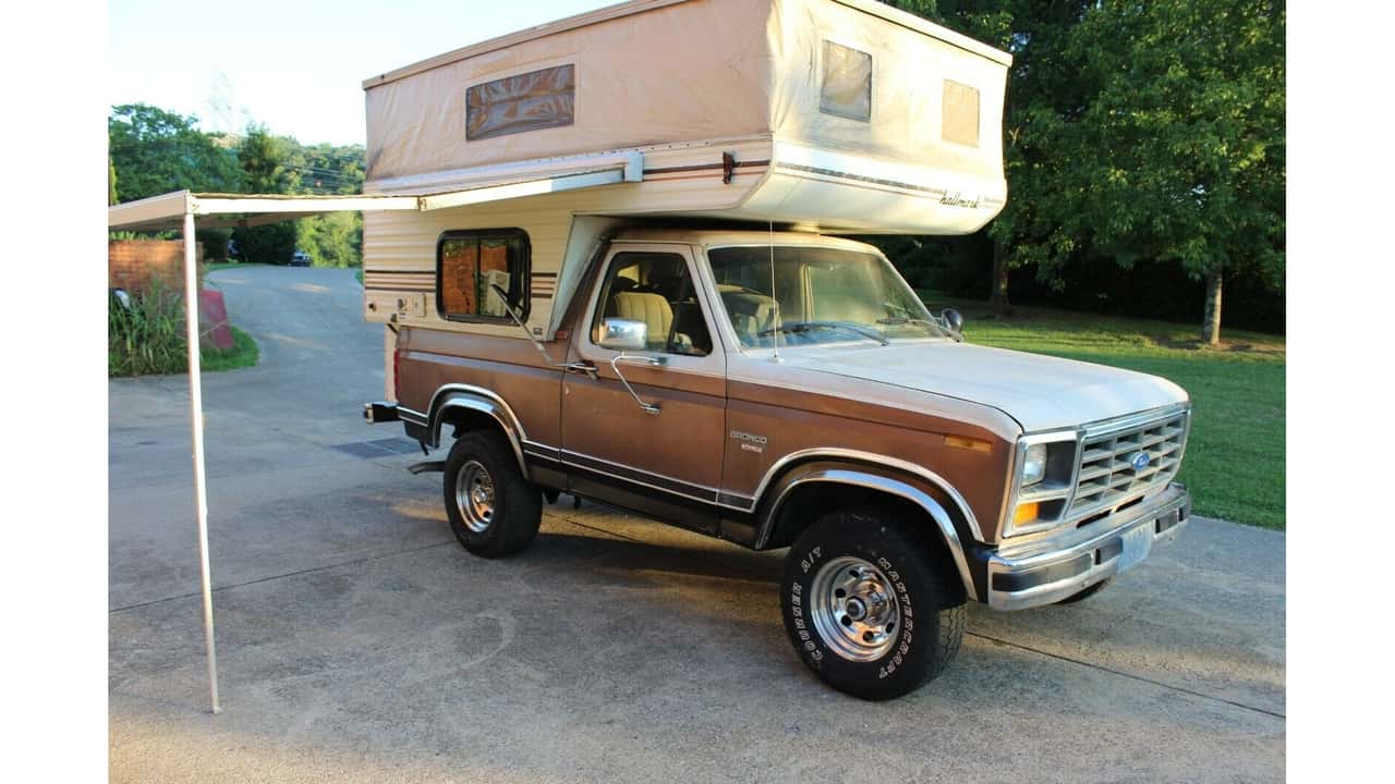 1982 ford bronco with pop-top camper is an odd, classic overlander