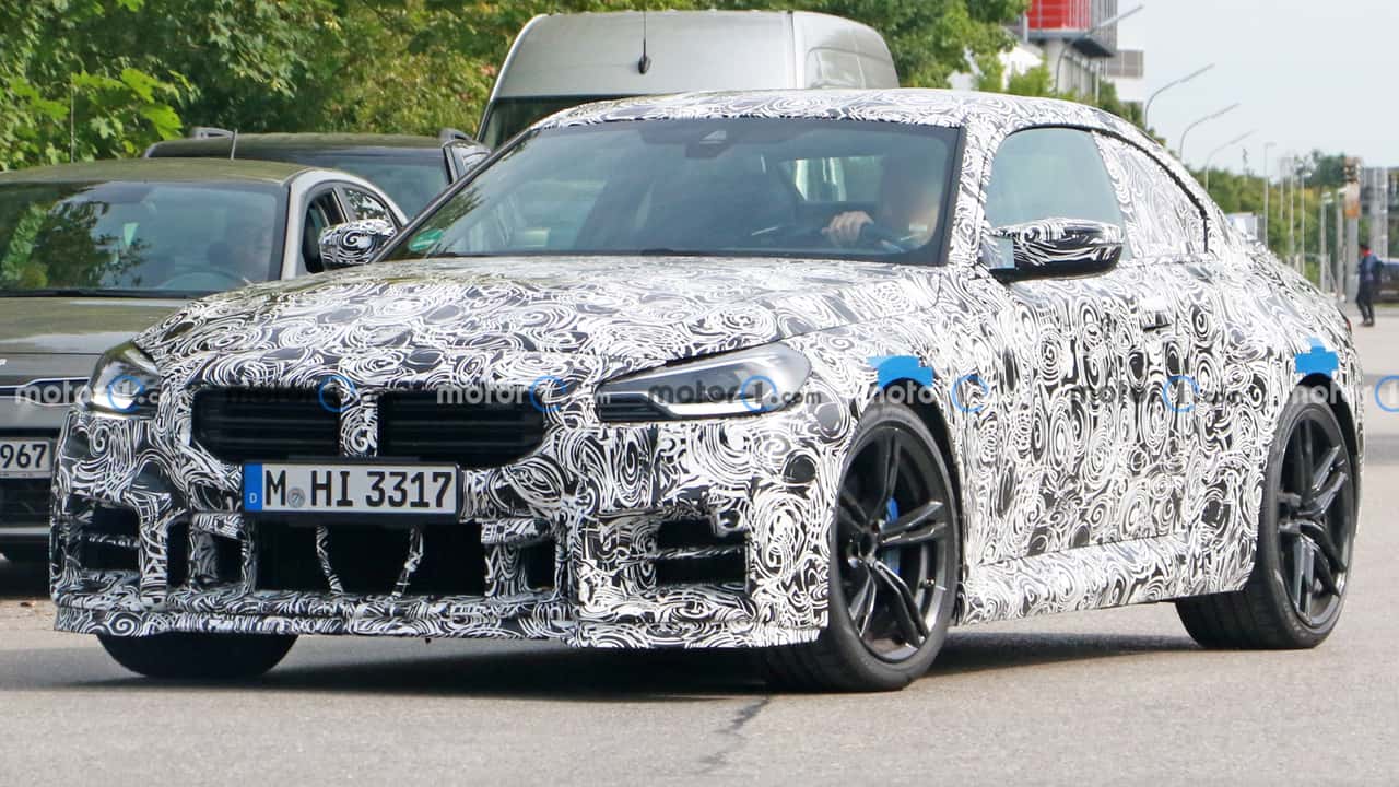 bmw m2 cs spied riding low with new front spoiler
