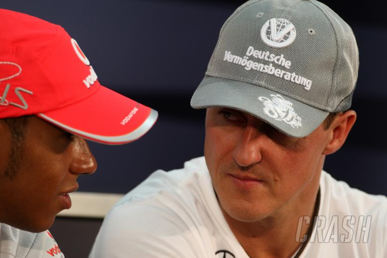 lewis hamilton ignored by ex rival: “michael schumacher and fernando alonso head and shoulders above”