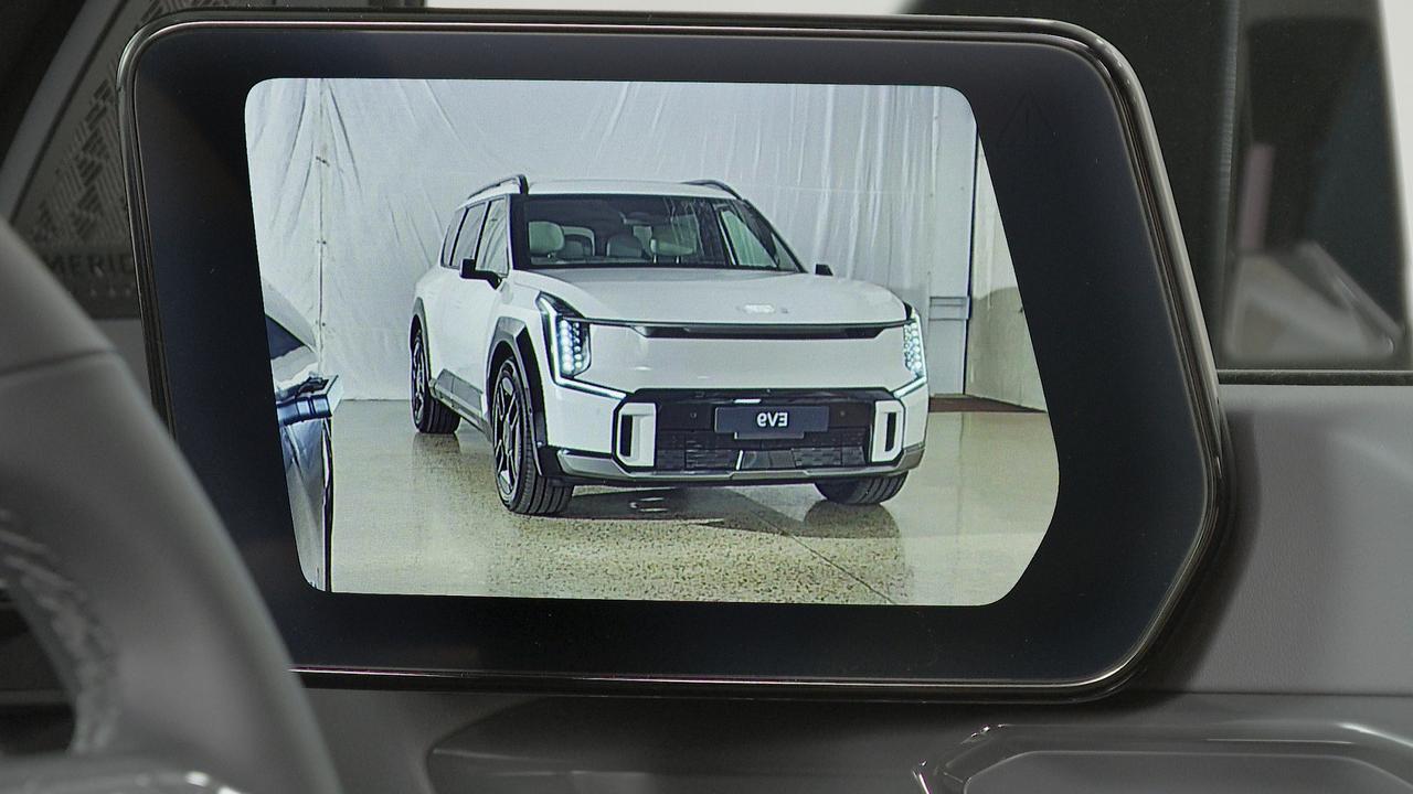 Digital mirrors feature in the EV9 GT-Line., Kia’s EV9 is the only large electric seven-seater on sale., The EV9 has a well-appointed cabin., The Kia EV9 GT-Line will be the brand’s first $100,000-plus car., The Kia EV9 represents new territory for Kia., Technology, Motoring, Motoring News, Kia EV9 sizes up BMW’s X5